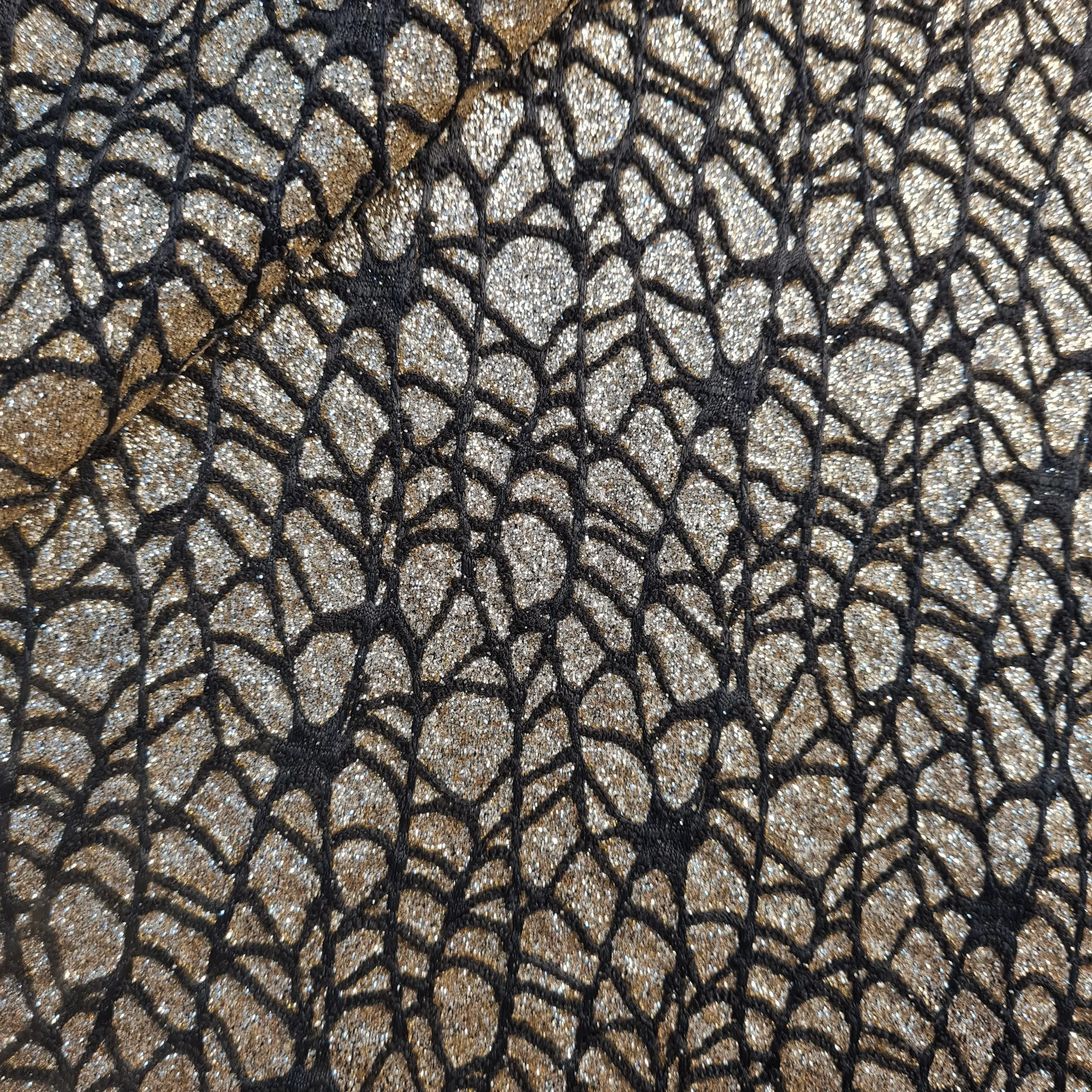 Black and Golden Glitter Knitted Lycra Fabric 17910